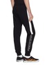 Back View - Click To Enlarge - PALM ANGELS - Logo stripe outseam sweatpants