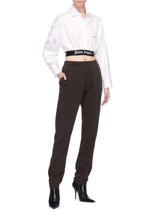 Figure View - Click To Enlarge - PALM ANGELS - Slogan embroidered logo waistband cropped shirt