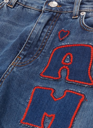  - - - 'Amore' slogan heart appliqué patchwork flared jeans