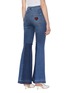 Back View - Click To Enlarge - - - 'Amore' slogan heart appliqué patchwork flared jeans
