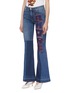 Front View - Click To Enlarge - - - 'Amore' slogan heart appliqué patchwork flared jeans