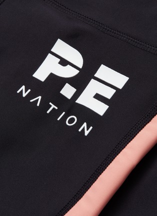  - P.E NATION - 'Chasse' logo print contrast panel performance leggings