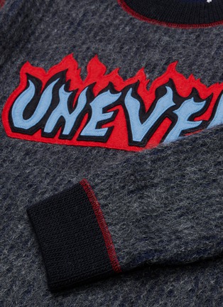  - KOLOR - 'Uneven' slogan appliqué contrast border brushed sweater