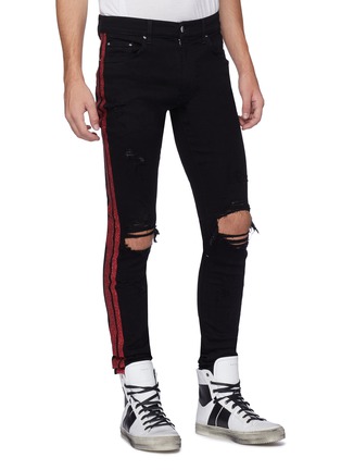 Front View - Click To Enlarge - AMIRI - 'Track' glitter stripe outseam ripped skinny jeans