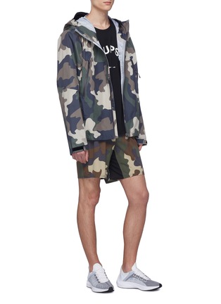 Figure View - Click To Enlarge - THE UPSIDE - 'All Weather' camouflage print hooded ripstop track jacket