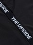  - THE UPSIDE - Logo stripe outseam performance leggings