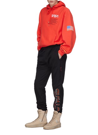 Figure View - Click To Enlarge - HERON PRESTON - Cyrillic embellished outseam track pants