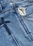 - RTA - '1' reflective logo cross print ripped skinny jeans