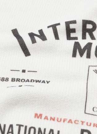  - MONSE - 'International Monse' slogan print contrast sleeve turtleneck sweater