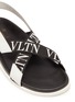 Detail View - Click To Enlarge - VALENTINO GARAVANI - Valentino Garavani Logo print cross strap slingback sandals