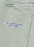  - ACNE STUDIOS - Logo embroidered acid washed jogging pants
