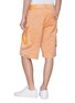 Back View - Click To Enlarge - FENG CHEN WANG - Washed denim cargo shorts