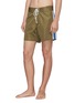 Figure View - Click To Enlarge - NOON GOONS - 'Kickout' stripe outseam swim shorts