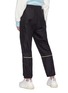 Back View - Click To Enlarge - ACNE STUDIOS - Contrast piping zip cuff track pants