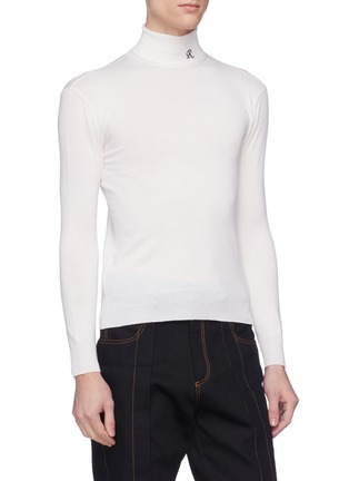 Front View - Click To Enlarge - RAF SIMONS - Logo embroidered Merino wool blend turtleneck sweater