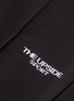  - THE UPSIDE - 'Black on Black' logo embroidered cropped track pants