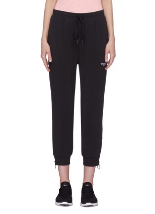 Main View - Click To Enlarge - THE UPSIDE - 'Black on Black' logo embroidered cropped track pants