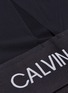  - CALVIN KLEIN PERFORMANCE - Slit back logo hem cropped performance T-shirt