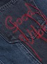 Detail View - Click To Enlarge - GRLFRND - 'Tina' slogan embroidered panelled denim skirt