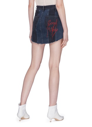 Back View - Click To Enlarge - GRLFRND - 'Tina' slogan embroidered panelled denim skirt