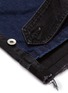  - SACAI - Belted cuff epaulette patchwork jeans