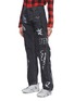 Front View - Click To Enlarge - VETEMENTS - Mix motif logo print patchwork straight leg jeans