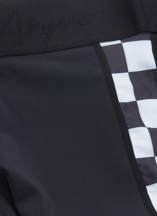  - ABYSSE - 'Osa' checkerboard outseam performance shorts