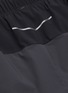  - ISAORA - 'V.3' reflective stripe mesh inseam track shorts