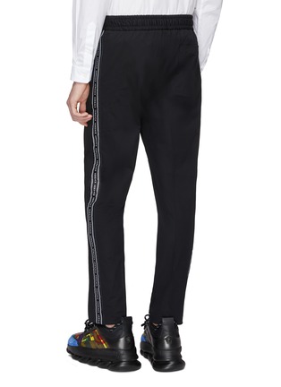 Back View - Click To Enlarge - VERSACE - 'Nastro' logo stripe outseam track pants