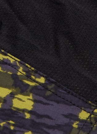  - THE UPSIDE - 'Ikat Ultra Trainer' camouflage print track shorts