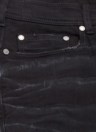  - NEIL BARRETT - Distressed skinny jeans