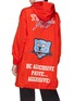 Back View - Click To Enlarge - UNDERCOVER - 'Total Youth' slogan graphic print hooded raincoat