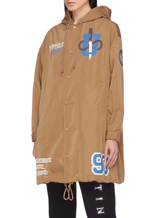 Front View - Click To Enlarge - UNDERCOVER - 'Total Youth' slogan graphic print hooded raincoat