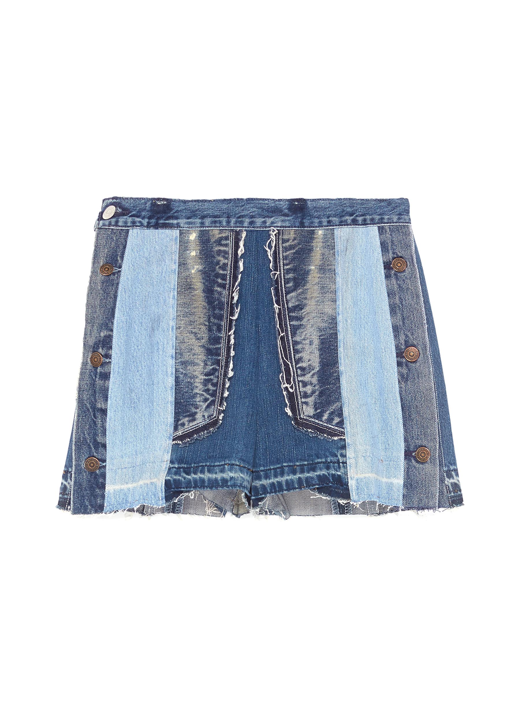 Button outseam frayed patchwork denim shorts by Atelier Reservé