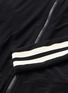  - NORMA KAMALI - Stripe sleeve turtleneck track jacket