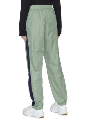 Back View - Click To Enlarge - ACNE STUDIOS - Face patch stripe outseam track pants