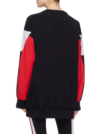 Back View - Click To Enlarge - NO KA’OI - 'Huli Nau' colourblock Sensitive® performance sweatshirt