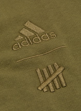  - ADIDAS X UNDEFEATED - Logo embroidered zip hoodie