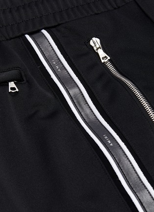  - AMIRI - Logo print leather stripe outseam track pants