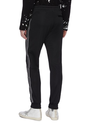 Back View - Click To Enlarge - AMIRI - Logo print leather stripe outseam track pants