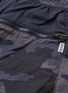  - NIKE - 'NSW' logo embroidered camouflage print ripstop jogging pants