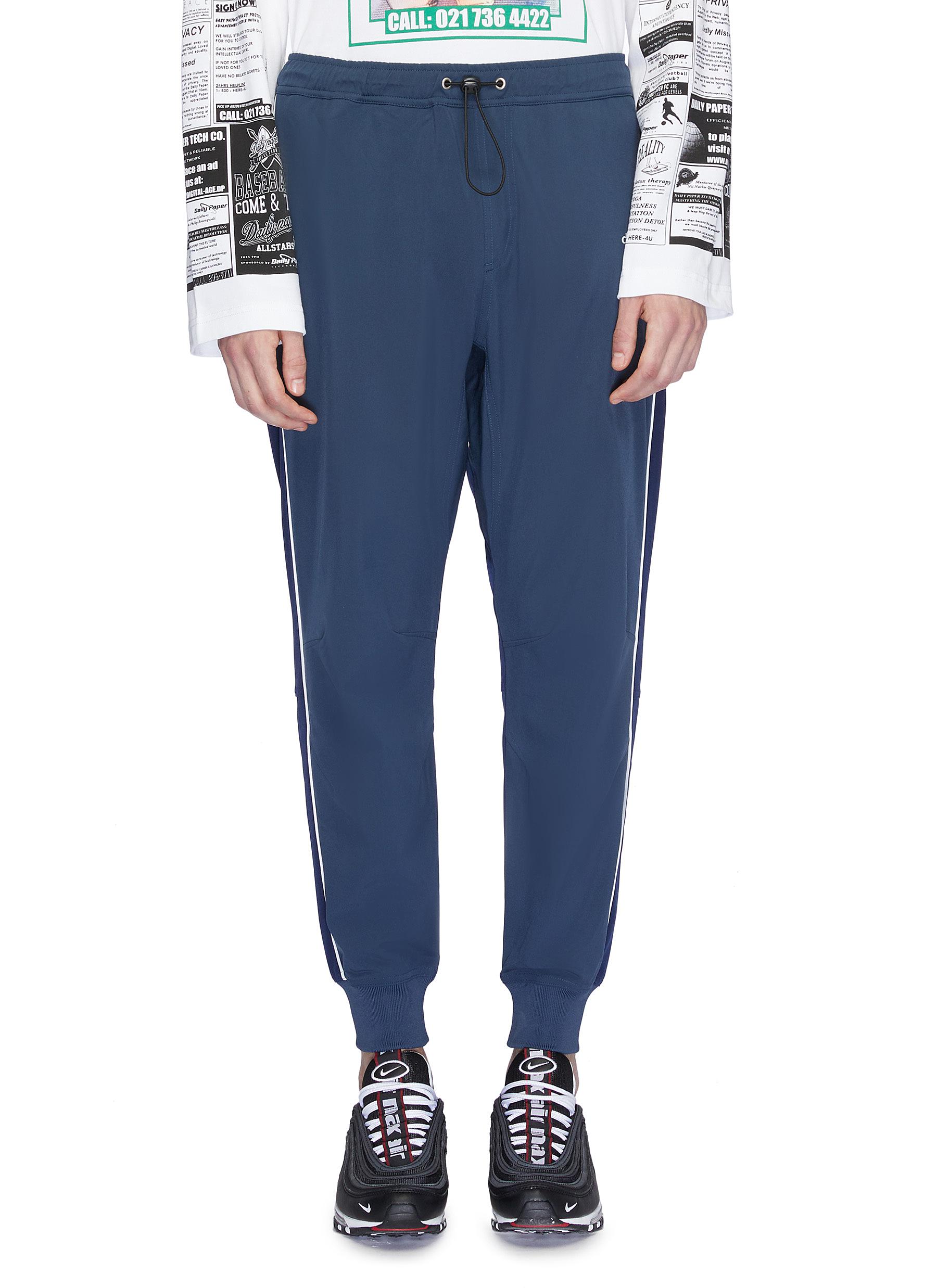 konstruktion måle i stedet Daily Paper 'chike' Contrast Piping Drop Crotch Jogging Pants | ModeSens