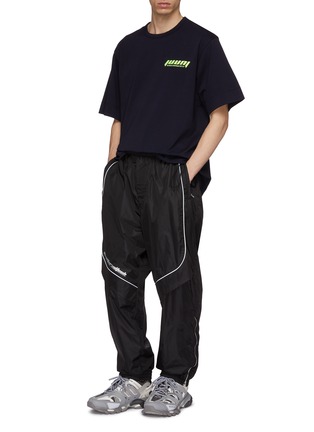 Figure View - Click To Enlarge - JUUN.J - Slogan print contrast piping panelled track pants