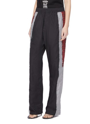 Front View - Click To Enlarge - VETEMENTS - Mix pattern stripe outseam unisex track pants