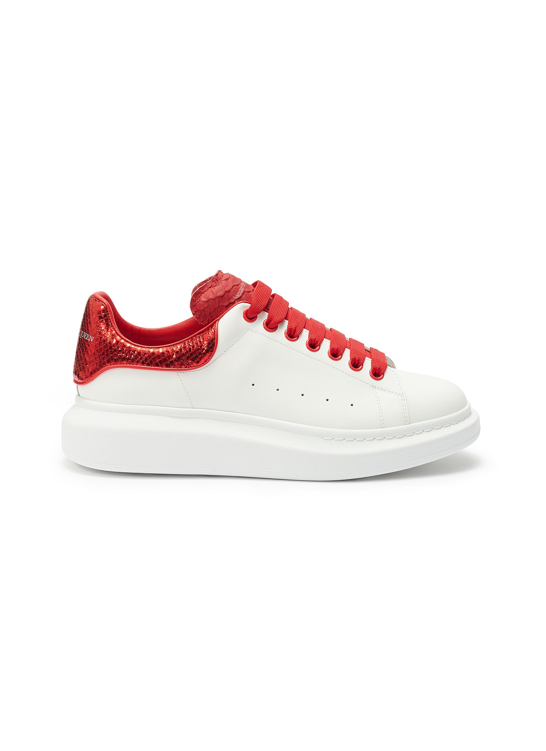 Click to view more detailed imagery on our partner's website Alexander Mcqueen 'Oversized Sneaker' In Leather With Snake Embossed Collar In White