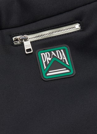  - PRADA - Zip pocket logo patch jersey pants