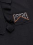  - PRADA - Logo intarsia ruffle half-zip knit polo shirt