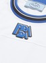 - PRADA - Logo appliqué stripe knit collar T-shirt