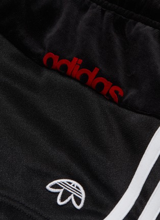  - ADIDAS ORIGINALS BY ALEXANDER WANG - 'Disjoin' stripe outseam patchwork track shorts