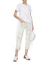 Figure View - Click To Enlarge - COLLINA STRADA - Cow print faux fur cropped jeans
